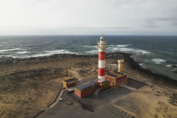 aerial view taken by drone of the Toston Lighthouse during a summer sunset, Fuerteventura, Canary Island, Spain, Europe