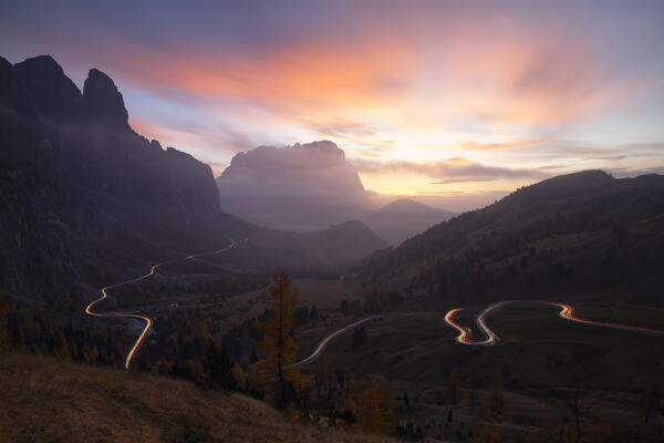 an amazing sunset shoted from the drone at Gardena pass during an autumn sunset, Gardena valley, Bolzano province, Trentino Alto Adige, Dolomiti, Italy, Europe