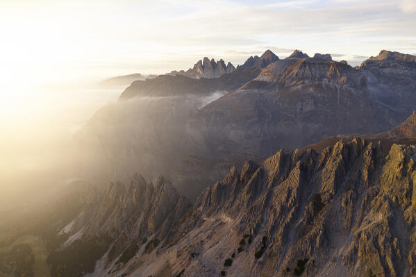 an amazing warm light envelope the landscape at Gardena pass, during an autumn sunset, Gardena valley, Bolzano province, Trentino Alto Adige, Dolomiti, Italy, Europe