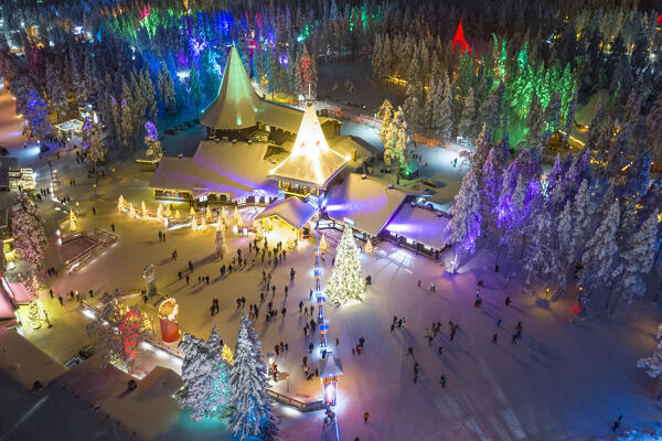 aerial view of illuminated santa claus village in arctic night, Rovaniemi, Finland, Europe