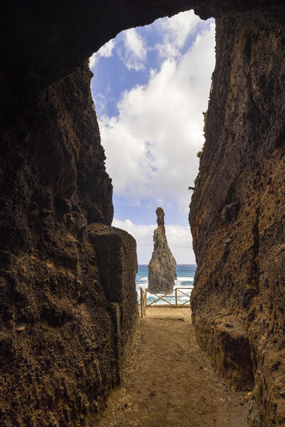 the beautiful view from the basaltic cave towards the Praia da Ribeira da Janela beach during a spring day, Porto Moniz, Madeira Island, Portugal, Europe