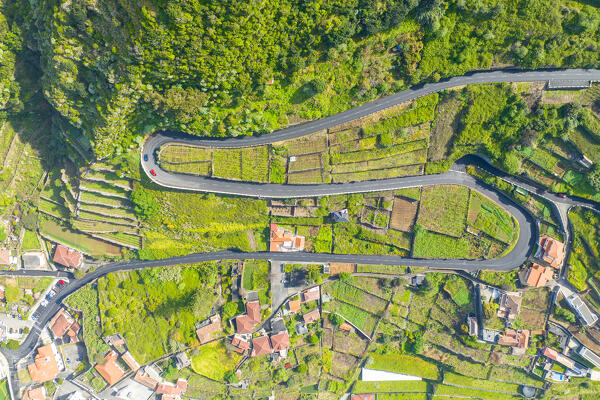 Aerial vertical view of the mountain road in Madeira Island during a sunny spring day, Porto Moniz, Madeira, Portugal, Europe