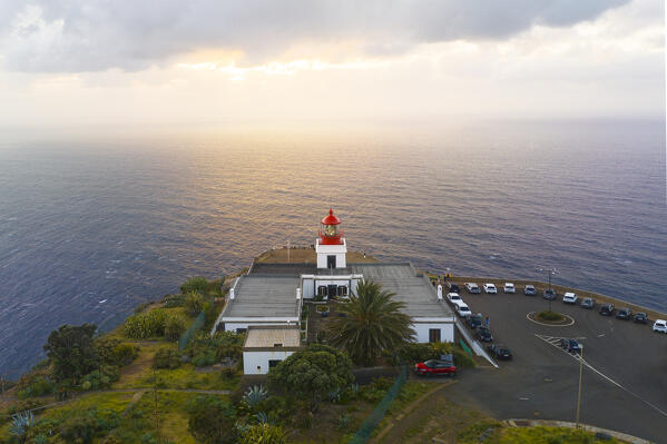 a warm light envelope the beautiful Farol da Ponta do Pargo during a spring sunset, Madeira, Portugal, Europe
