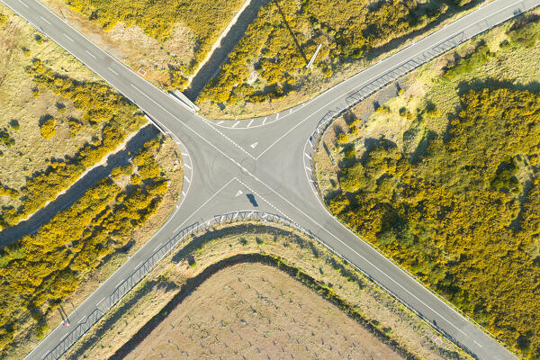 aerial shot drone view of a road junction on the mountain roads in Madeira island during a beautiful sunny spring day, Madeira, Portugal, Europe