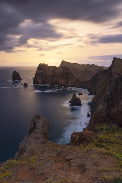 a long exposure to capture the warm light of the sunset in Sao Lourenco peninsula during a spring day, Madeira, Portugal, Europe