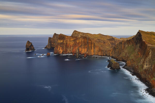 a long exposure to capture the warm light of the sunset in Sao Lourenco peninsula during a spring day, Madeira, Portugal, Europe