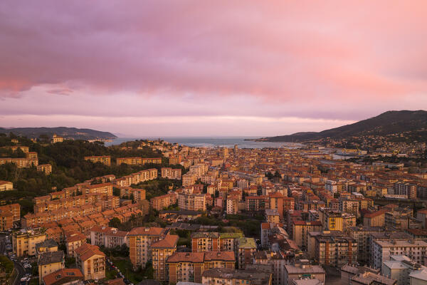 aerial view taken by drone of the beautiful city of La Spezia, during the warm sunset, La Spezia, Liguria, Italy, Europe
