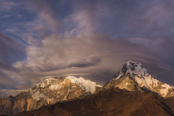 Clouds above Annapurna range at sunset, Himalayas, Nepal