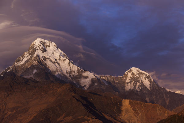 Clouds above Annapurna range at sunset, Himalayas, Nepal