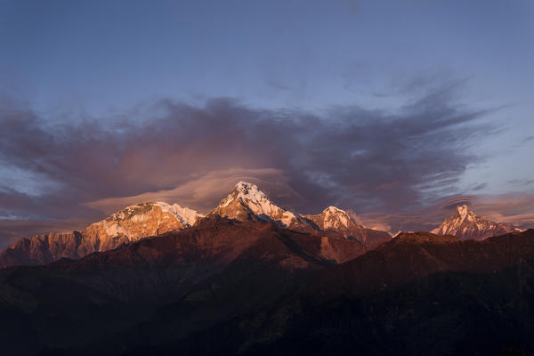 Clouds above Annapurna range at sunset, Himalayas, Nepal