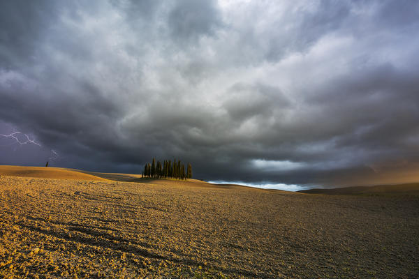 Thunderstorm over cypresses, San Quirico d'Orcia, Siena, Tuscany, Italy, Southern Europe
