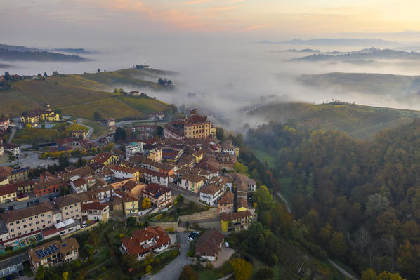 Aerial view of Falletti Castle and Barolo at sunrise during autumn, Cuneo, Langhe e Roero, Piedmont, Italy, Southern Europe