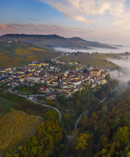 Aerial view of Falletti Castle, Barolo and La Morra in the distance at sunrise during autumn, Cuneo, Langhe e Roero, Piedmont, Italy, Southern Europe