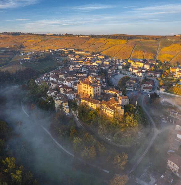 Aerial view of Falletti Castle and Barolo at sunrise during autumn, Cuneo, Langhe e Roero, Piedmont, Italy, Southern Europe