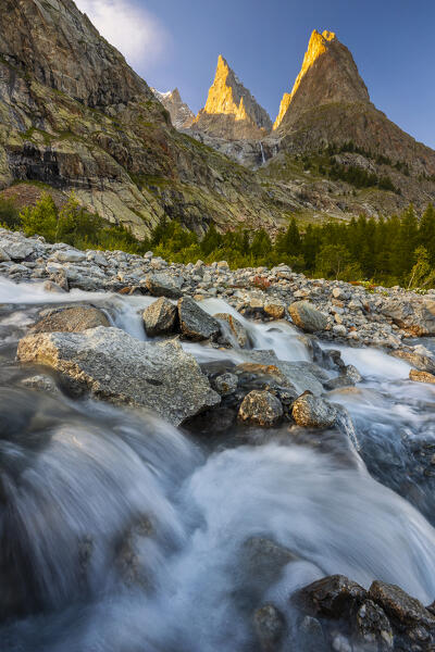 Dora di Veny river and Aiguille Noire de Peuterey at sunset during summer, Val Veny, La Visaille, Courmayeur, Valle D’Aosta, Italy, Southern Europe 