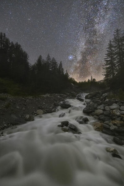 Milkyway and stars at Dora di Veny river during summer, Val Veny, La Visaille, Courmayeur, Valle D’Aosta, Italy, Southern Europe 