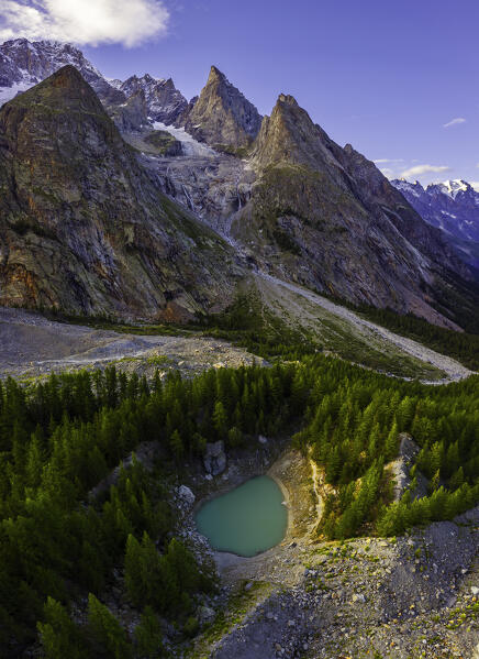 Aerial view of Lac du Jardin du Miage or Lac Vert and Aiguille Noire de Peuterey at sunset during summer, Val Veny, La Visaille, Courmayeur, Valle D’Aosta, Italy, Southern Europe 
