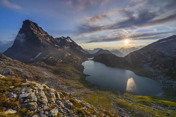 Rossa Pass and Geisspfadsee at sunset during summer, Alpe Devero, Val D’Ossola, Verbano Cusio Ossola, Piedmont, Italy, Western Europe