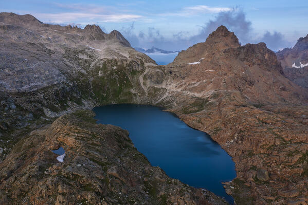 Aerial view of Rossa Pass and Geisspfadsee at sunset during summer, Alpe Devero, Val D’Ossola, Verbano Cusio Ossola, Piedmont, Italy, Western Europe