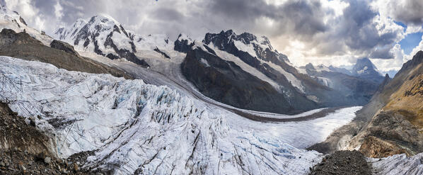 Panoramic view of the surface of Gornergrat glacier during summer and Matterhorn mountain, Zermatt, Canton of Valais, Visp, Switzerland, Western Europe