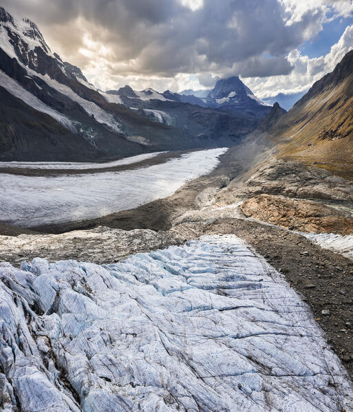 Panoramic view of the surface of Gornergrat glacier during summer and Matterhorn mountain, Zermatt, Canton of Valais, Visp, Switzerland, Western Europe
