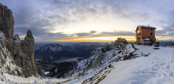 Panoramic view of Torrione del Cinquantenario and Rifugio Rosalba after sunset during winter, Colle Pertusio, Mandello del Lario, Lecco, Lombardy, Italy, Southern Europe