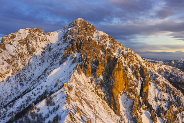 Aerial view of Rifugio Rosalba and Grigna at sunset during winter, Colle Pertusio, Mandello del Lario, Lecco, Lombardy, Italy, Southern Europe