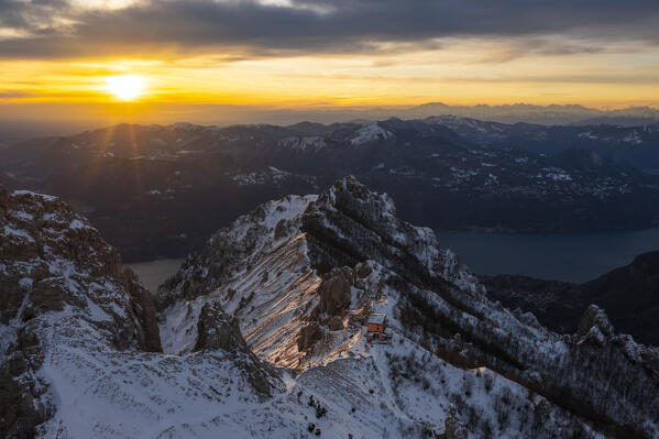 Aerial view of Rifugio Rosalba at sunset during winter, Colle Pertusio, Mandello del Lario, Lecco, Lombardy, Italy, Southern Europe