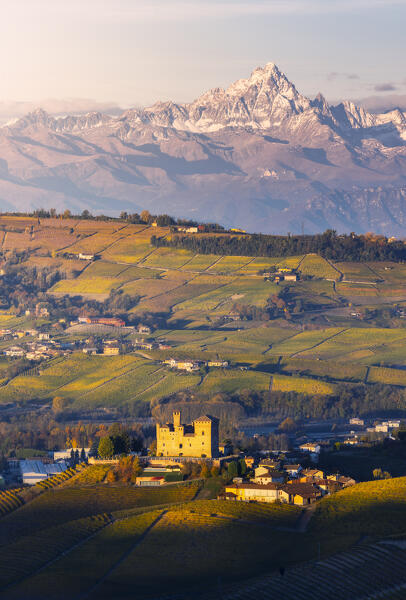 Grinzane Cavour and Monviso at sunrise during  autumn, Cuneo, Langhe and Roero, Piedmont, Italy, Southern Europe