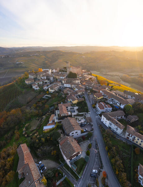 Aerial view of Castiglione Falletto at sunrise during  autumn, Cuneo, Langhe and Roero, Piedmont, Italy, Southern Europe