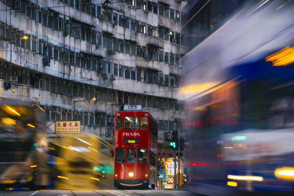 Tram and Monster Buildings at rush hour, Quarry Bay. Hong Kong, China, Asia