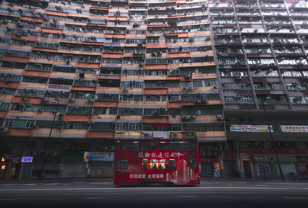 Tram and Nam Tin building, North Point. Hong Kong, China, Asia