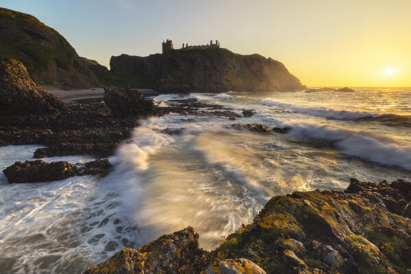 Dunnnottar Castle at sunrise, Stonehaven, Aberdeenshire, Scotland, United Kingdom