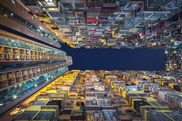 Illuminated Monster Buildings during night, Quarry Bay. Hong Kong, China, Asia