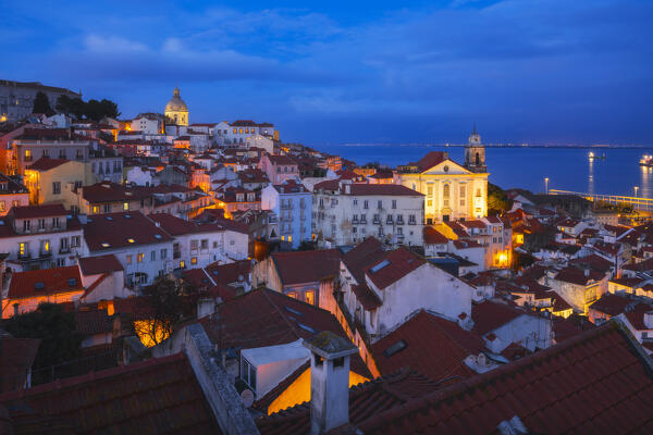 View of Lisbon and Tago river from Portas do Sol viewpoint during blue hour, Alfama, Lisbon, Portugal, Iberian peninsula, Western Europe