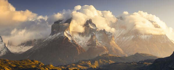 Panoramic view of Cuernos del Paine during sunrise, Torres del Paine NP, Ultima Esperanza, Region de Magallanes y de la Antartica Chilena, Patagonia, Chile, South America
