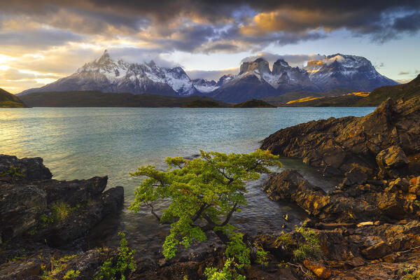Cuernos del Paine and Lake Pehoe during sunset, Torres del Paine NP, Ultima Esperanza, Region de Magallanes y de la Antartica Chilena, Patagonia, Chile, South America