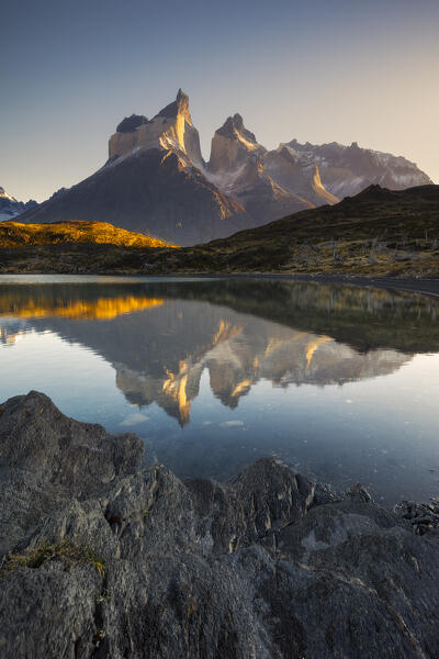 Cuernos del Paine reflected in Lake Nordenskjold during sunrise, Torres del Paine NP, Ultima Esperanza, Region de Magallanes y de la Antartica Chilena, Patagonia, Chile, South America