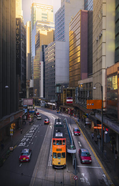 Tram and taxi in Des Voeus Road Central, Central, Hong Kong, China, Asia