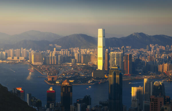 Elevated view of Hong Kong cityscape and International Commerce Centre viewed from Victoria Peak during sunset, The Peak, Hong Kong island, Hong Kong, China, Asia