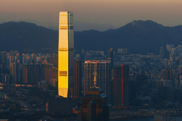 Elevated view of Hong Kong cityscape and International Commerce Centre viewed from Victoria Peak during sunset, The Peak, Hong Kong island, Hong Kong, China, Asia