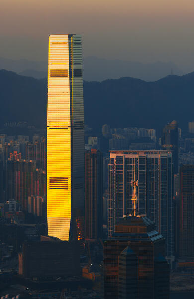 Elevated view of Hong Kong cityscape and International Commerce Centre viewed from Victoria Peak during sunset, The Peak, Hong Kong island, Hong Kong, China, Asia