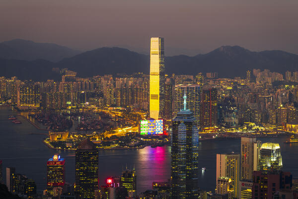 Elevated view of Hong Kong cityscape and International Commerce Centre viewed from Victoria Peak during sunset, The Peak, Hong Kong island, Hong Kong, China, Asia