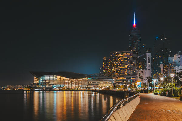 Illuminated Hong Kong cityscape and Convention and Exhibition Centre viewed from Tamar Park during night, Central, Hong Kong island, Hong Kong, China, Asia