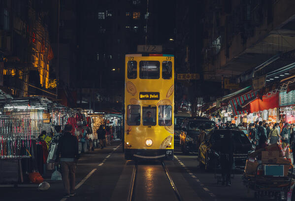 A tram in Chun Yeung street market during night, North Point, Hong Kong island, Hong Kong, China, Asia