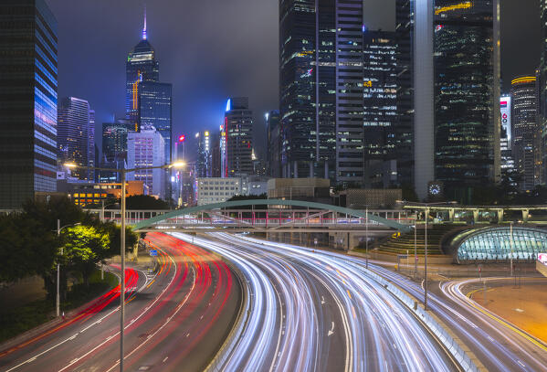 Rush hour in Wan Chai during night with car trails, Central, Hong Kong island, Hong Kong, China, Asia