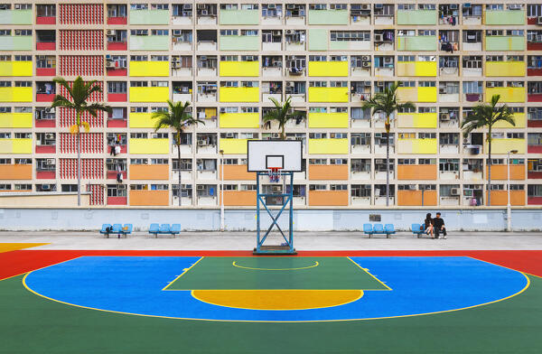 Choi Hung Estate rooftop basketball court and rainbow buildings, Ngau Chi Wan, Kowloon, Hong Kong, China, Asia