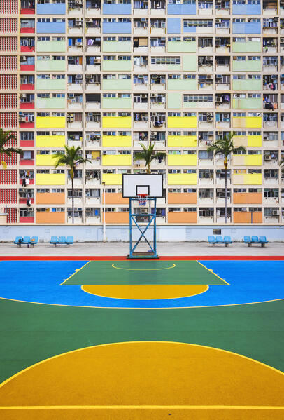 Choi Hung Estate rooftop basketball court and rainbow buildings, Ngau Chi Wan, Kowloon, Hong Kong, China, Asia