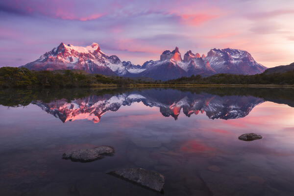 Lake Pehoe and Cuernos del Paine in the background during sunrise, Torres del Paine NP, Ultima Esperanza, Region de Magallanes y de la Antartica Chilena, Patagonia, Chile, South America
