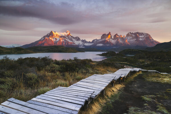 Lake Pehoe and Cuernos del Paine in the background during sunrise, Torres del Paine NP, Ultima Esperanza, Region de Magallanes y de la Antartica Chilena, Patagonia, Chile, South America